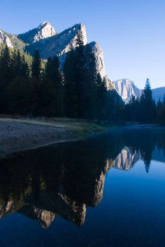Reflection Of The Three Brothers In The Merced River